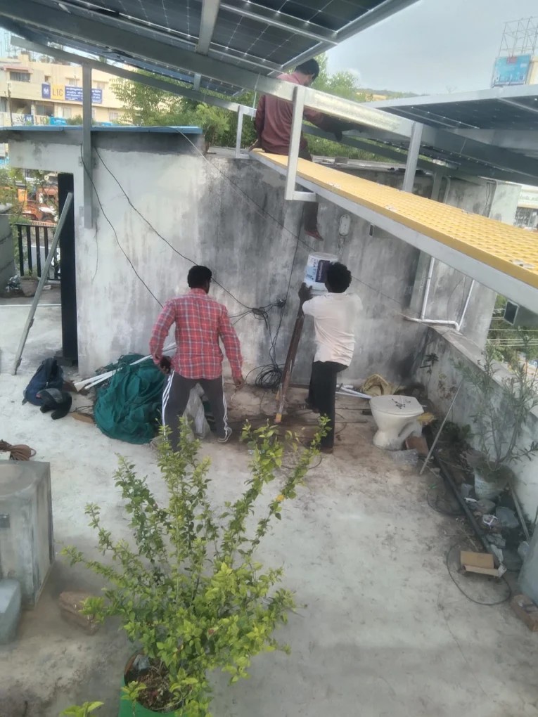 Solar structure assembled around rooftop water tank