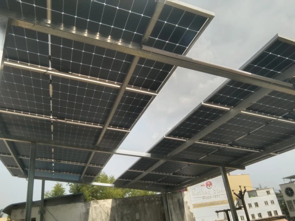 Cable tray routed under solar rooftop panels